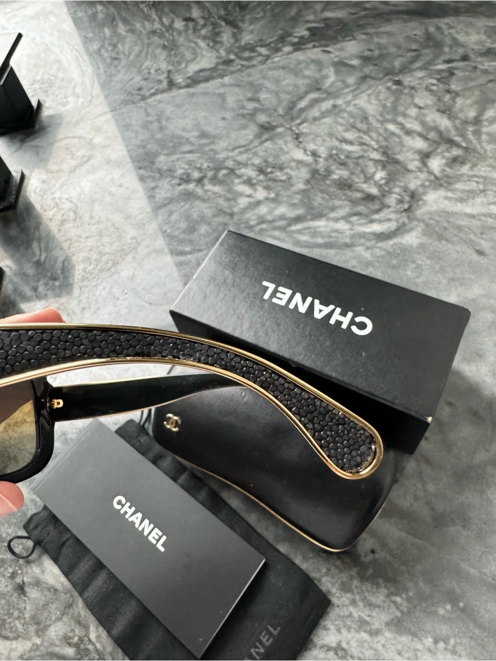 CHANEL Black Sunglasses with Gold Logo Accent